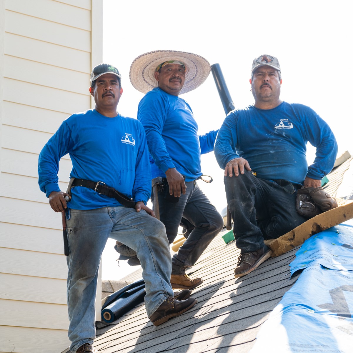 DeHart Roofing & Home Repair team working on a Texas roof
